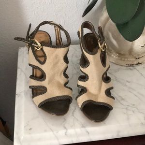 I’m selling a pair of tan with dark brown heels.